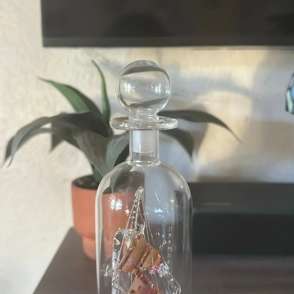 Glass boat inside a glass bottle Made in England